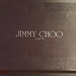 Jimmy Choo brown/camel stiletto boots.